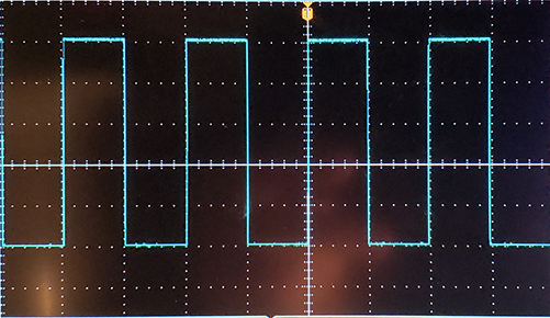 Correctly compensated oscilloscope probe response showing a flat square wave